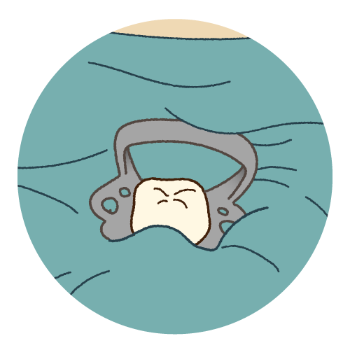 根管治療(歯内療法)で使用するゴムシート(ラバーダム)