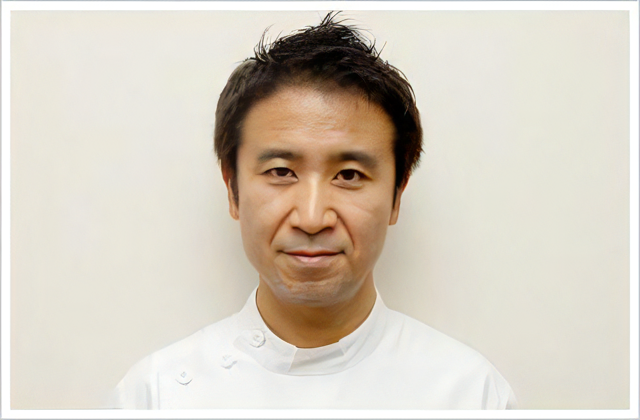 院長の川崎 健一