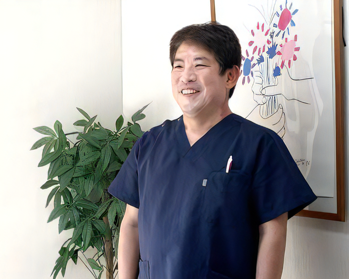 院長の豊島 明郎