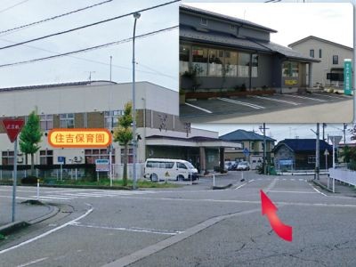 住吉保育園の通りに行き先を示す青い看板があります