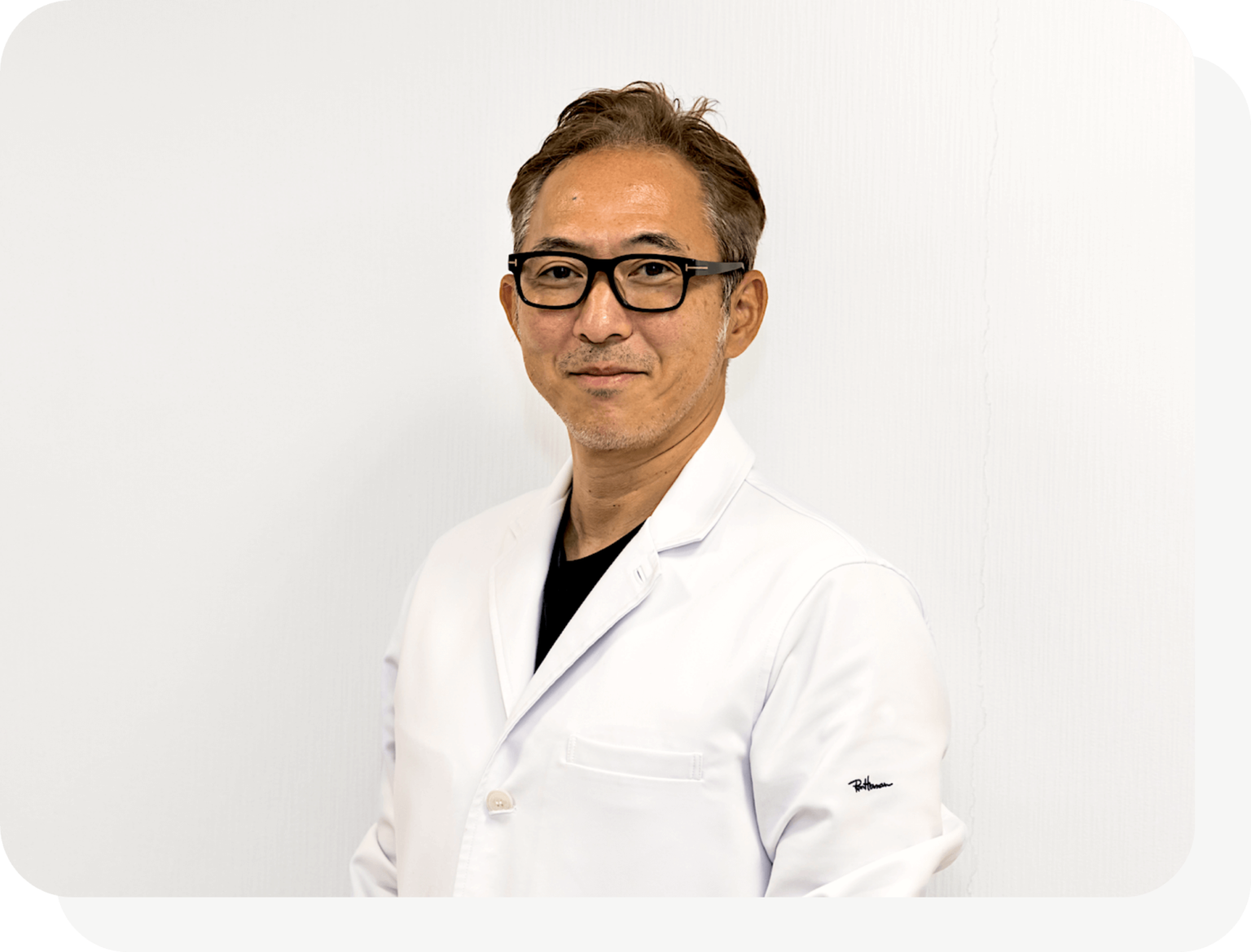 院長の本間正己