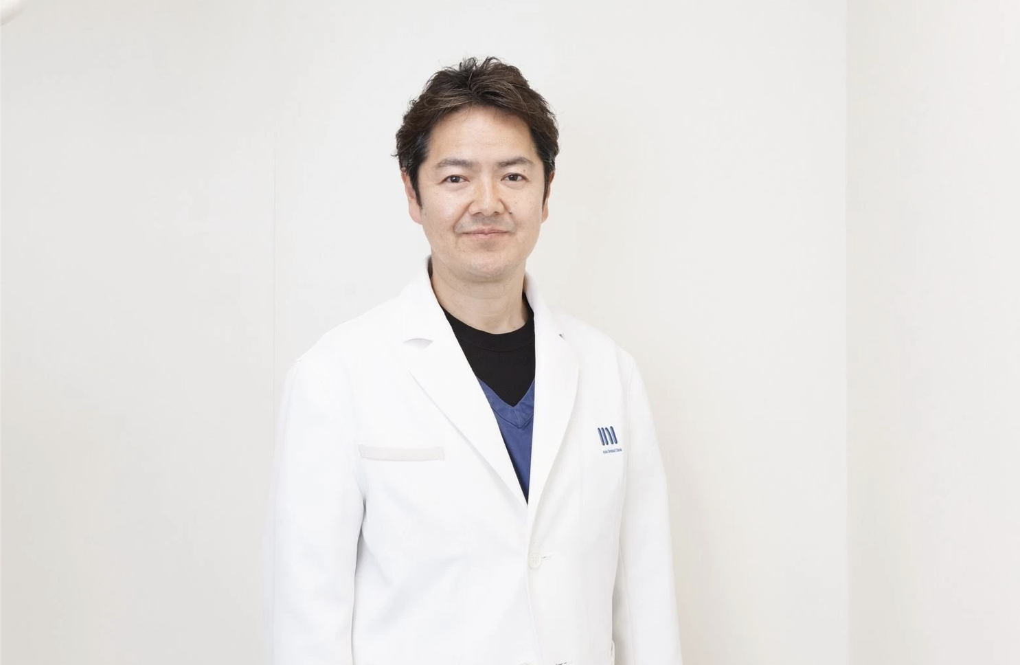 院長の新井 誠二