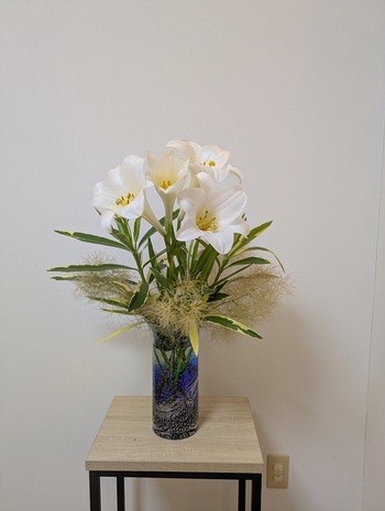 ①外観②待合室③医院玄関の花