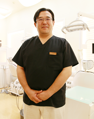院長の飯塚 俊輔