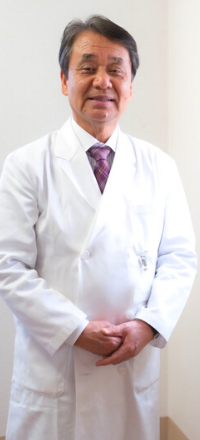 理事長の粕谷 健次